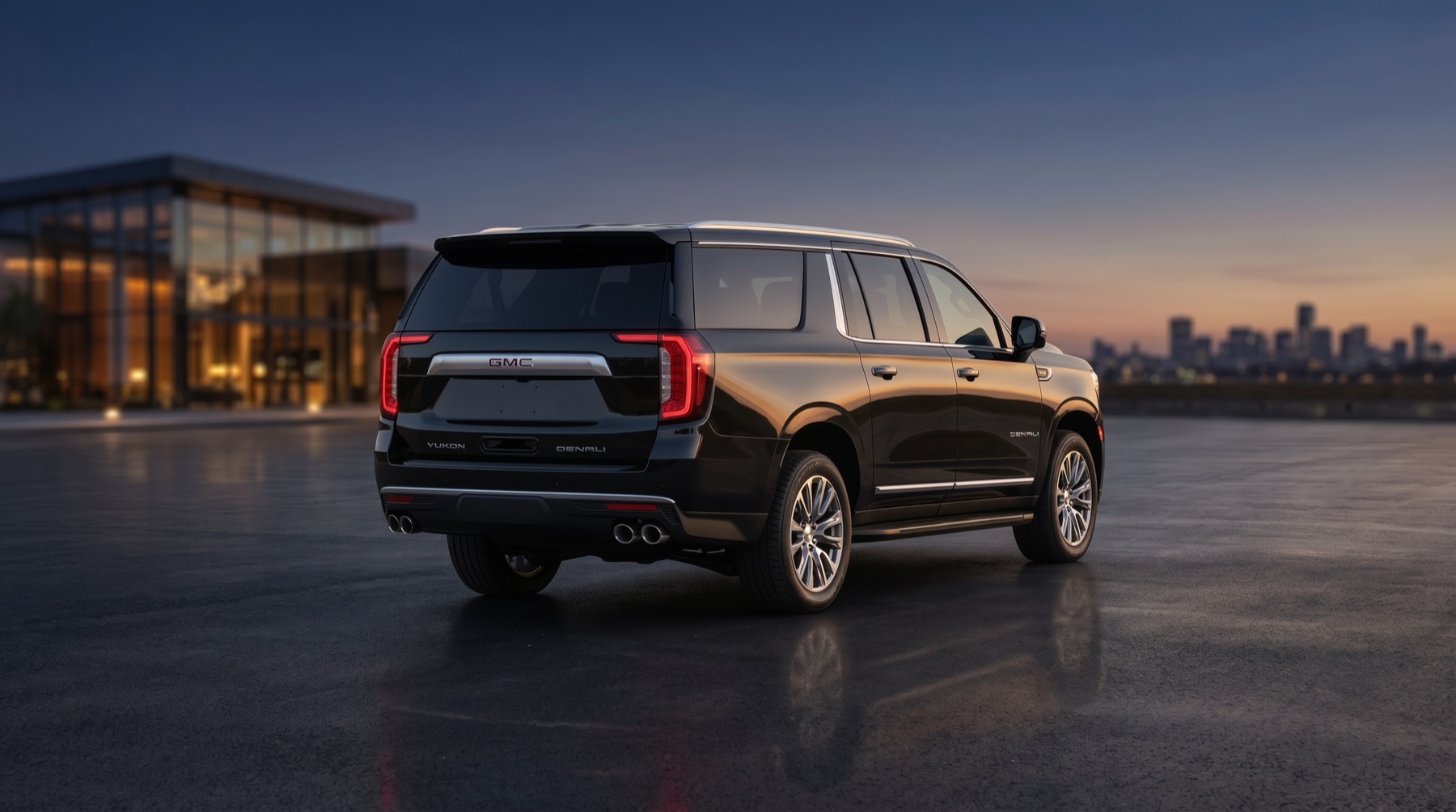 Luxivo's black Yukon XL Denali, rear three-quarter view at dusk